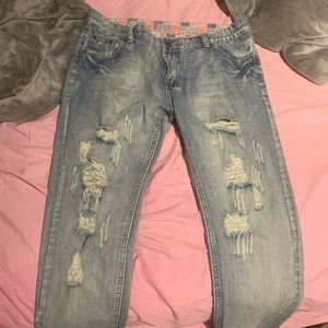Distressed fashion jeans with yellow tint